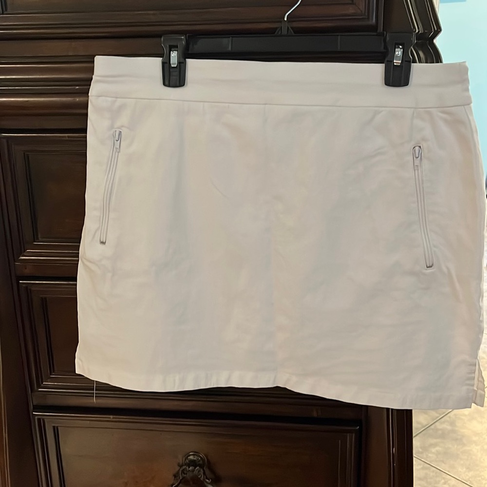 White skirt. NWOT size 14